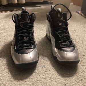 Nike size 6 1/2 Y metallic silver and black sneakers